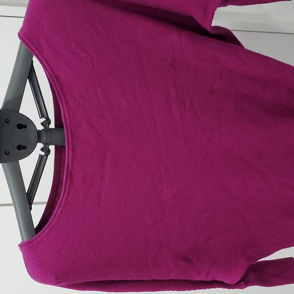 Purple off the shoulder asymmetrical sweater . Express xs can fit up to medium.
